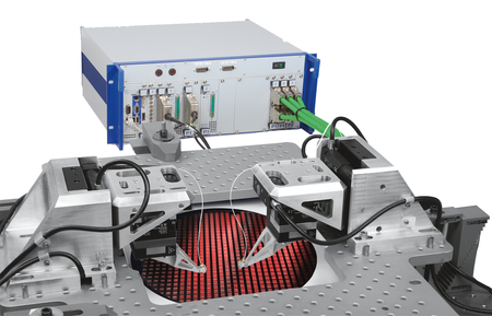 An FMPA system for double-sided probing of waveguide devices on-wafer. Fully digital and closed-loop, it implements exclusion-zone capability, an internal data recorder, nanoscale-stable position-hold, and firmware-based fast scanning, modeling and multichannel NxM gradient search capability. (Image: PI)