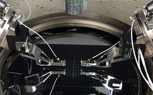Silicon photonics, the latest craze in the semiconductor industry. Here two piezo XYZ scanners mounted on two hexapods speed up wafer level testing. (Image: Cascade Microtech, a FormFactor company)